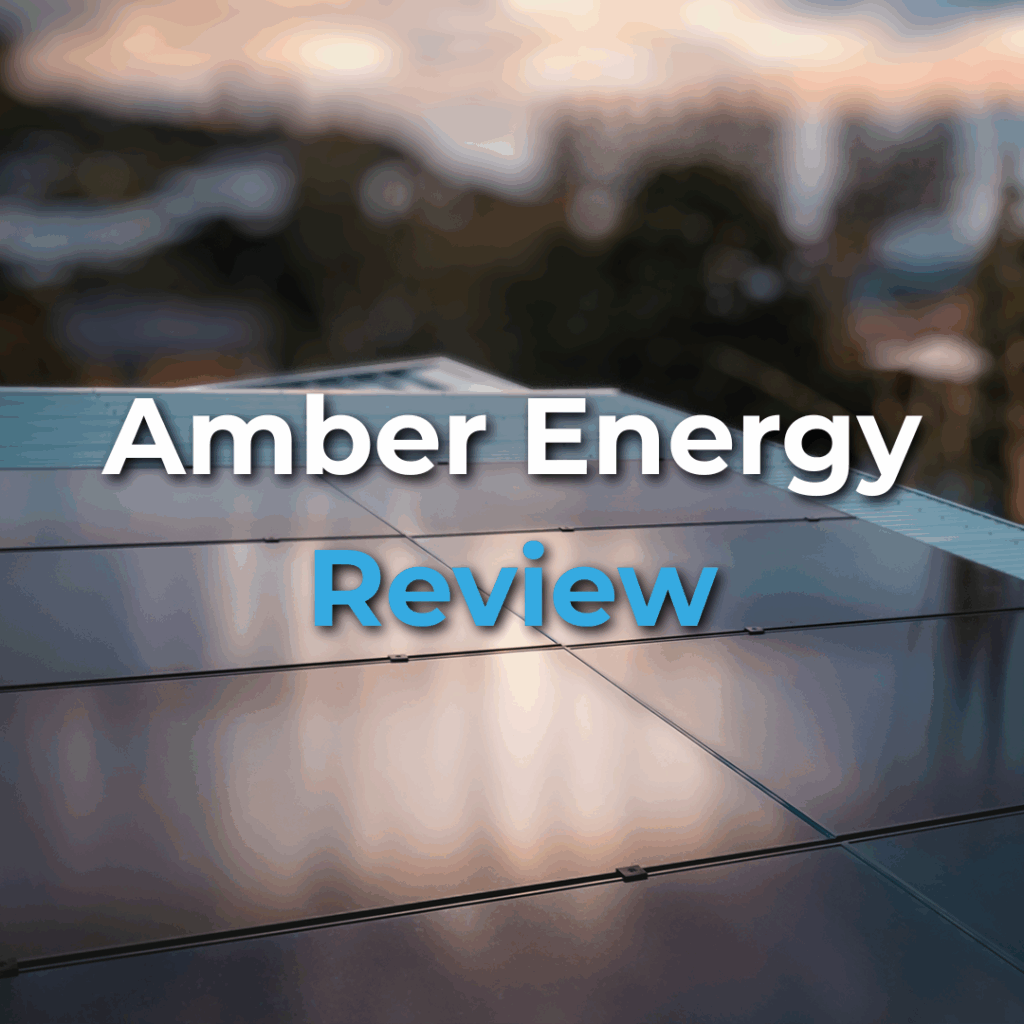 Rooftop solar panels in focus with blurred trees and sky in the background. Text overlay reads "Amber Energy Review.