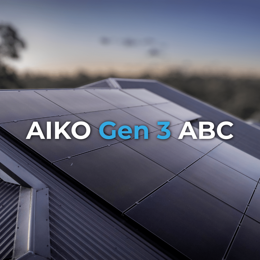 A rooftop with dark solar panels installed, labeled "AIKO Gen 3 ABC" in bold letters across the image.