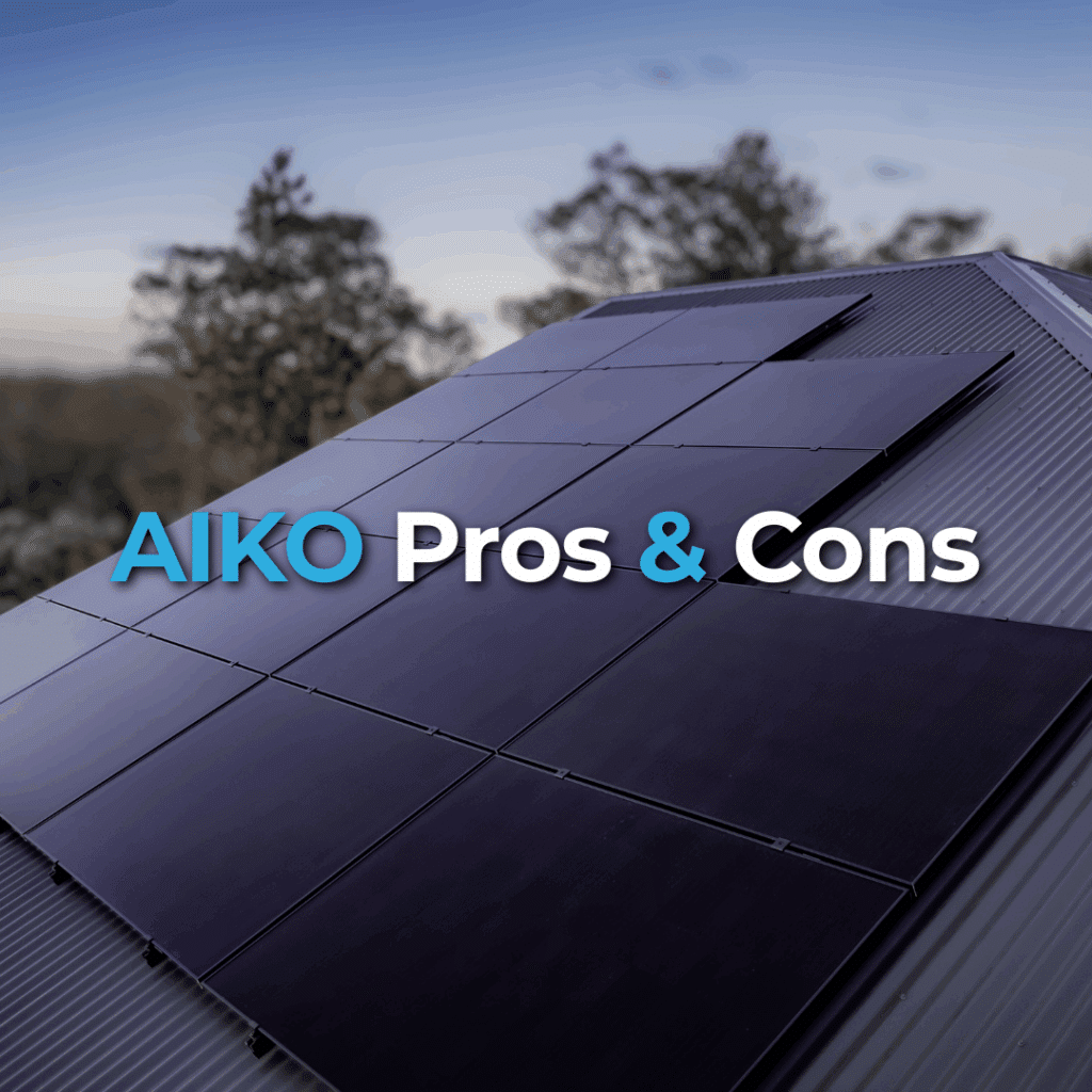 A rooftop with black solar panels installed, set against a blurry background of trees and sky; text reads "AIKO Pros & Cons.