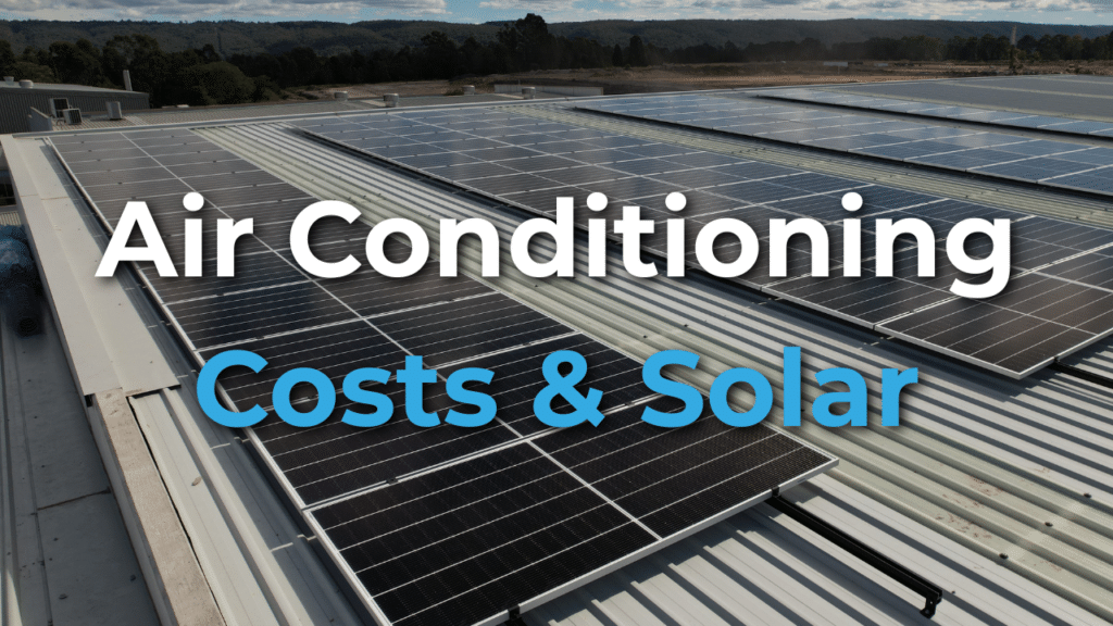 Rows of solar panels installed on a rooftop under a partly cloudy sky, with the text “Air Conditioning Costs & Solar” overlaid.