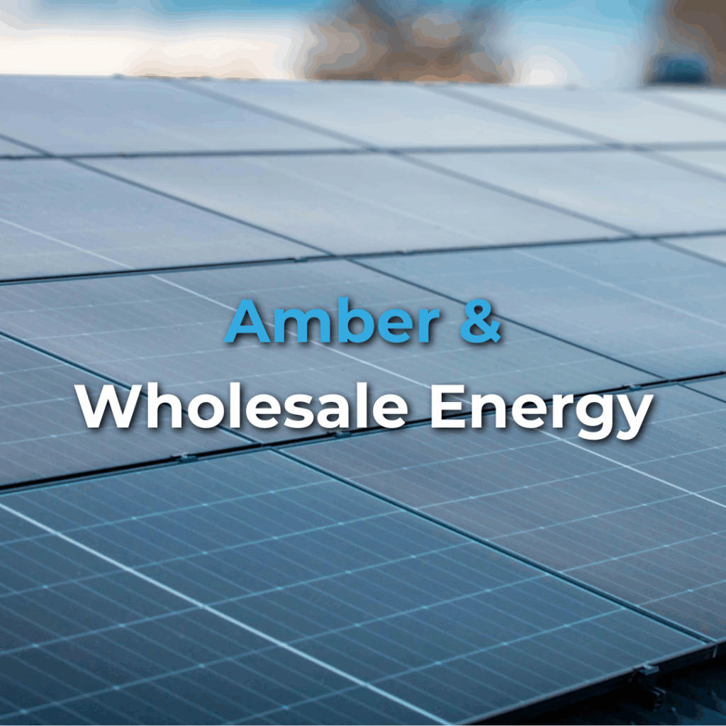 Close-up of solar panels with the text "Amber & Wholesale Energy" overlaid on the image.