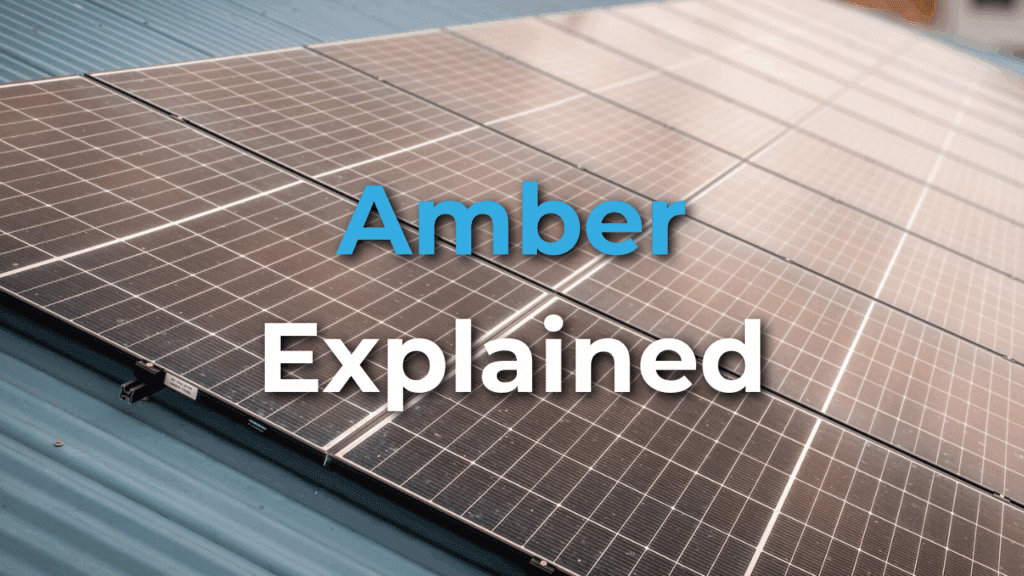 Close-up of solar panels on a rooftop with the words "Amber Explained" overlaid in blue and white text.