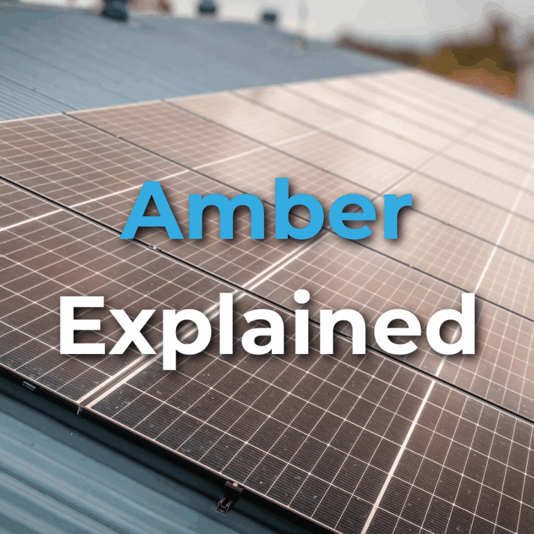 Solar panels on a blue metal roof with the words "Amber Explained" overlaid in blue and white text.