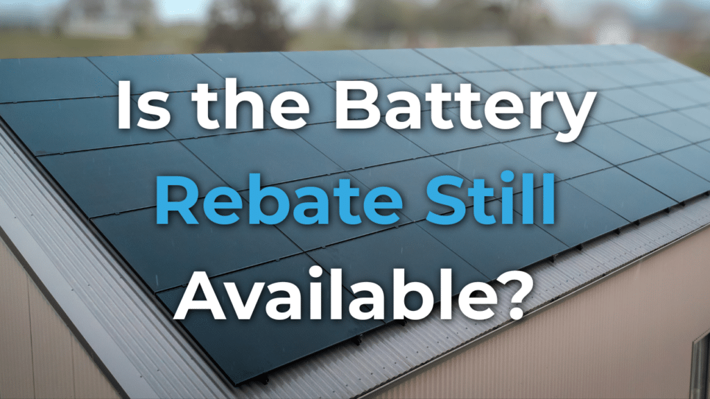 Rooftop solar panels with the text "Is the Battery Rebate Still Available?" displayed over the image.