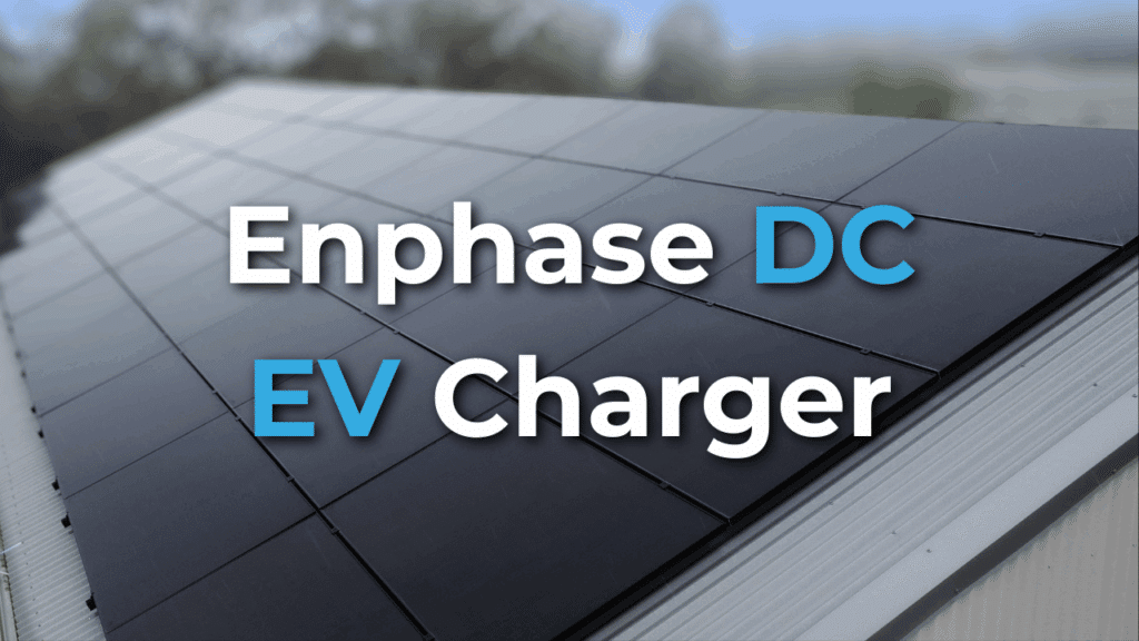Rows of black solar panels installed on a sloped roof with the text “Enphase DC EV Charger” overlaid in bold white and blue letters.