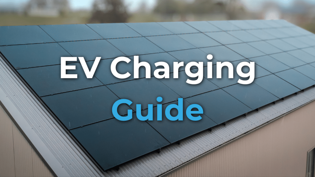 A rooftop covered with solar panels displays the text "EV Charging Guide" in large white and blue letters.