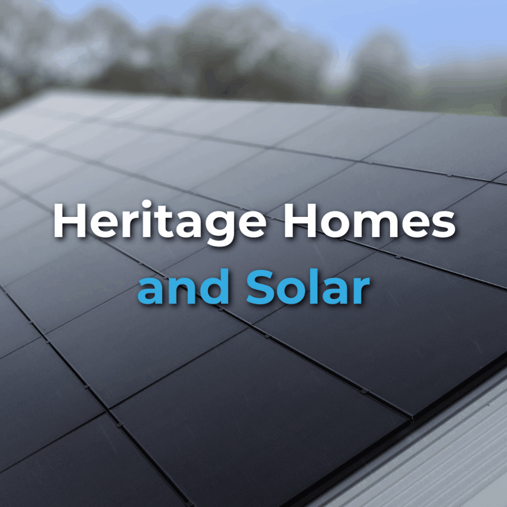 Close-up view of solar panels installed on a roof with the text "Heritage Homes and Solar" overlayed on the image.