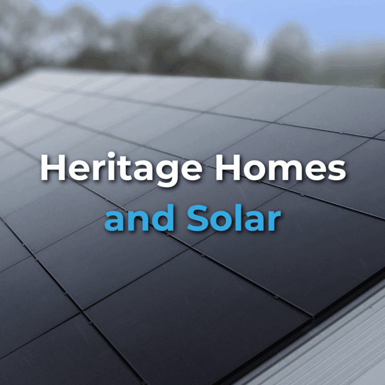 Close-up view of solar panels installed on a roof with the text "Heritage Homes and Solar" overlayed on the image.