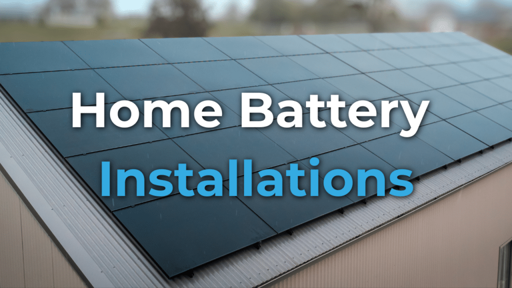 A house with a roof covered in solar panels, overlaid with the text "Home Battery Installations.