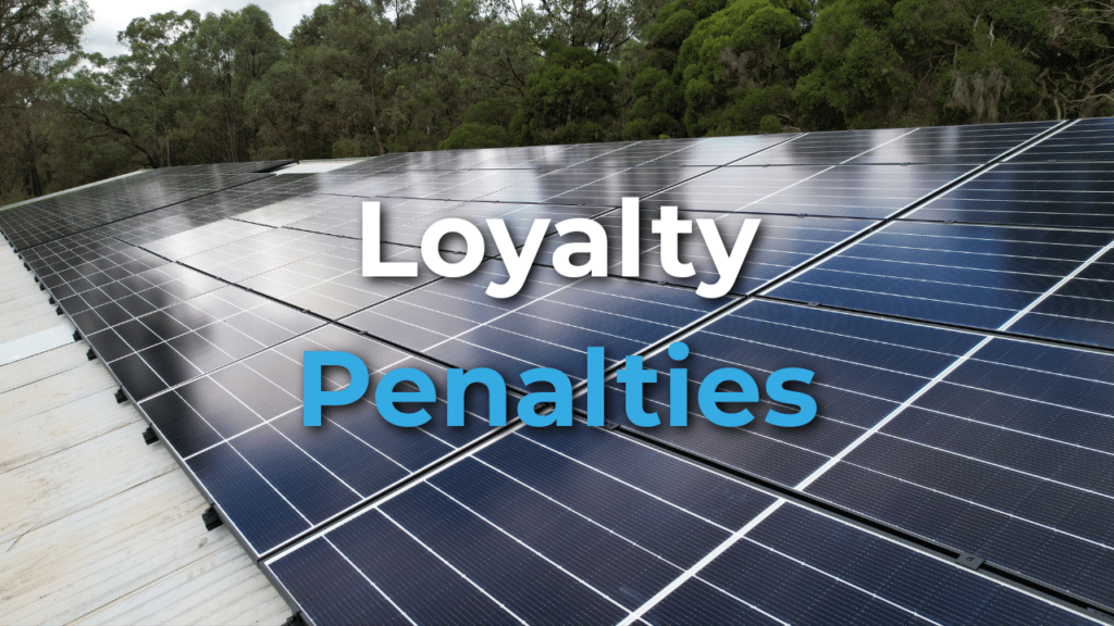 Rows of solar panels on a rooftop with the words "Loyalty Penalties" overlaid in large text. Trees are visible in the background.