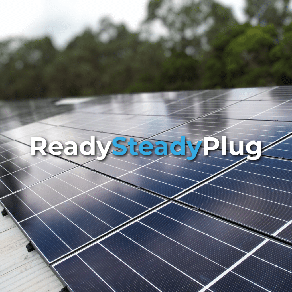 Rows of solar panels installed outdoors with the words "Ready Steady Plug" overlaid in white and blue letters. Trees are visible in the blurred background.