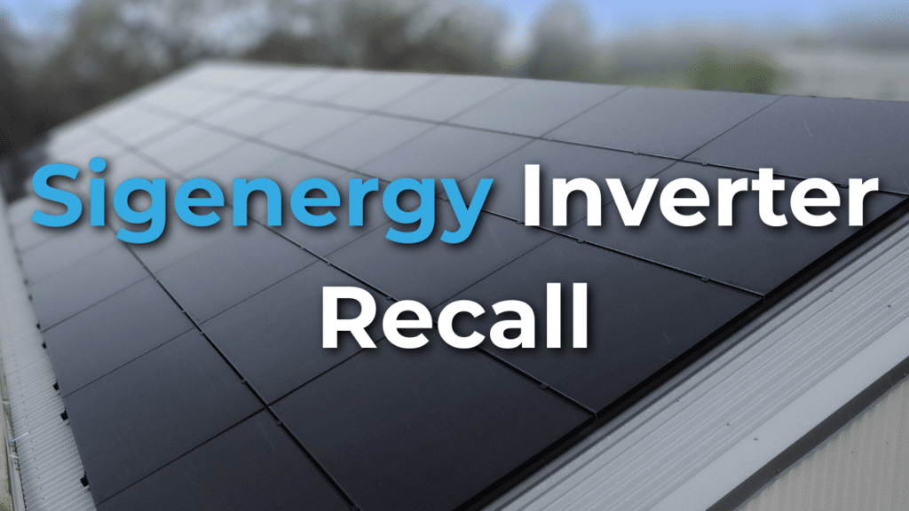 A close-up of rooftop solar panels with the text “Sigenergy Inverter Recall” overlaid on the image.