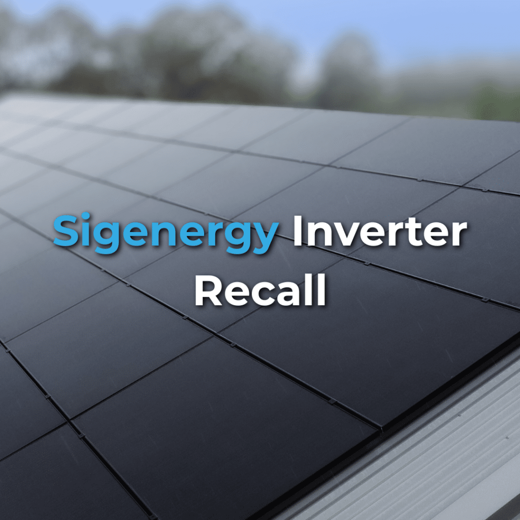 Close-up of solar panels on a rooftop with the text "Sigenergy Inverter Recall" overlaid on the image.
