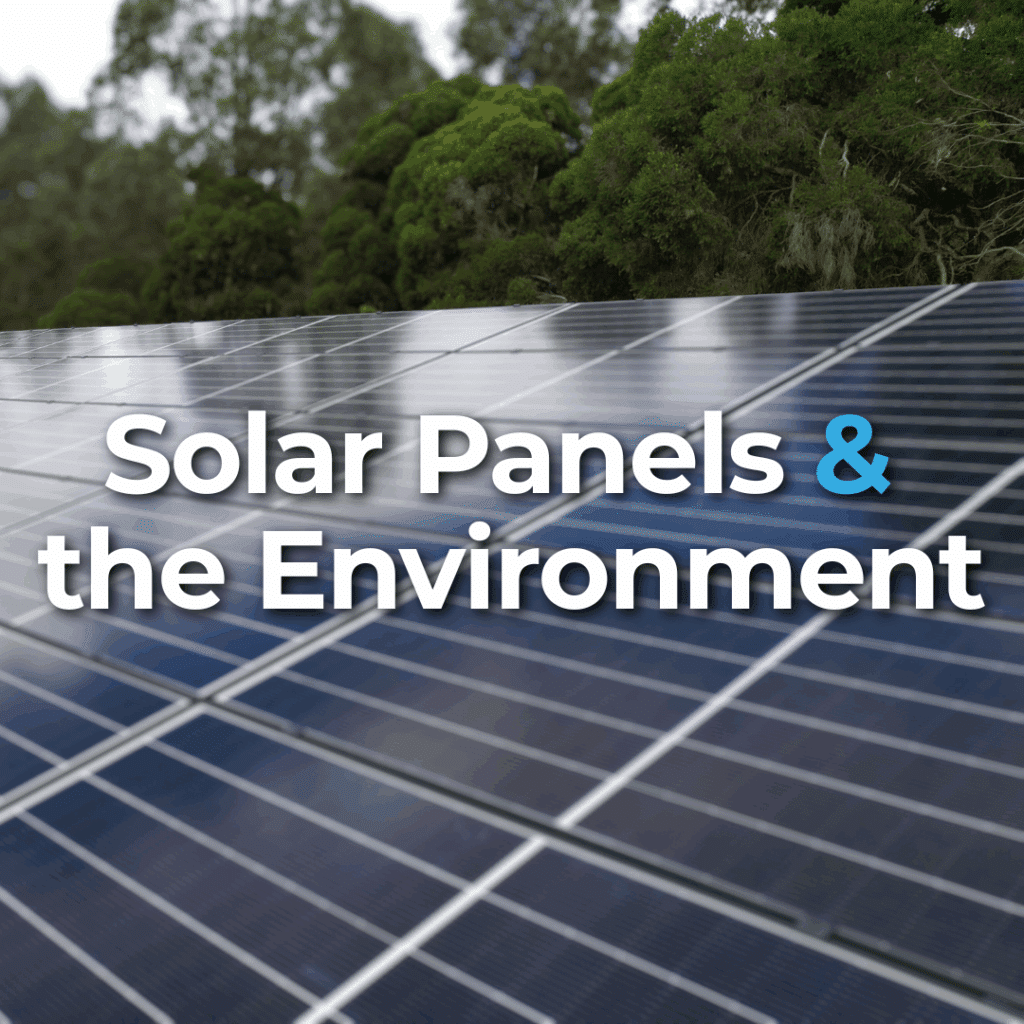 A large array of solar panels installed outdoors near green trees, with the text "Solar Panels & the Environment" overlaid on the image.