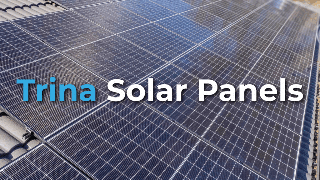 Close-up view of multiple solar panels installed on a rooftop with the text "Trina Solar Panels" overlaid on the image.